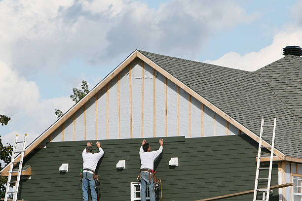 Professional Siding technician working in North Lewisburg, OH